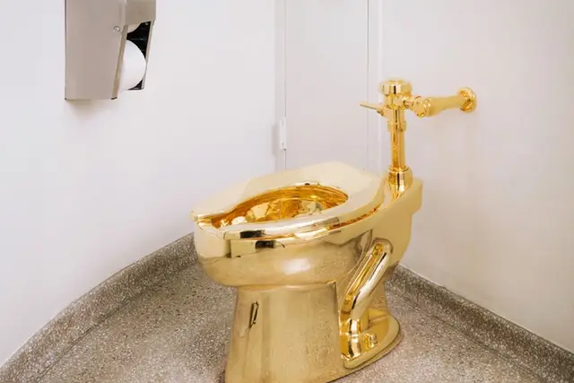 The golden toilet is serious business.